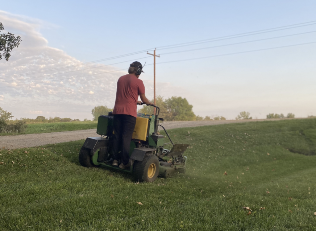 Travis Halonen Custom Mowing A Customer Lawn